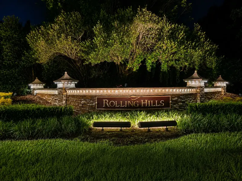 One of two Rolling Hills entrance monuments with lighting installed by Glow Bug in 2025.